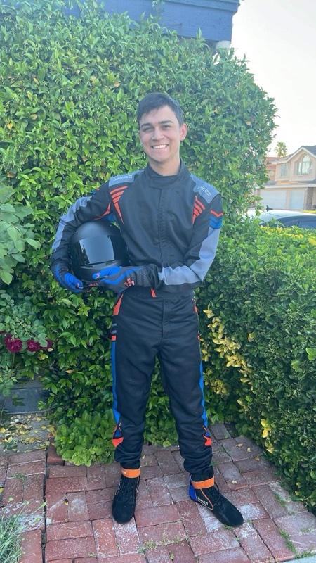 Benjamin Hartmann, Aqualine Performance instructor and motorsports operations, in racing suit